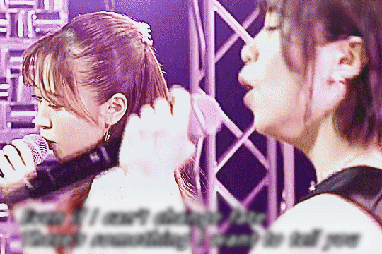 oda sakura and takagi sayuki turning to face each other as they emotionally perform MISIA's 'aitakute ima'