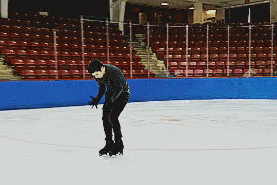 jacob sanchez doing a practice skate of his show program set to 'your idol' from k-pop demon hunters. he does a choreographic move borrowed from the song's original choreography in the movie where he leans his head back, covering his face with his hands