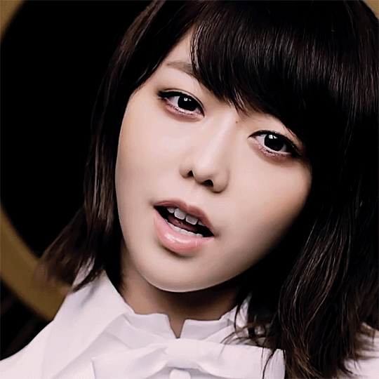 GIF from akb48's darashinai aishikata music video of one of minegishi minami's solo angle shots