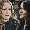 composited icon of two shots of adult lottie and van from yellowjackets edited together so that a shocked van who sees lottie as an adult for the first time in years looks to her as lottie looks back with a bleak smile