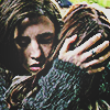 ginger snaps icon of brigitte hugging ginger with her hand on the back of ginger's head and an eerie look on her face