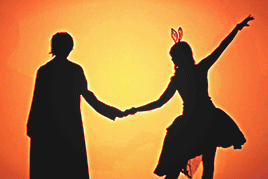 two silhouetted berryz members doing more suggestive poses, like a spin and other romantic things