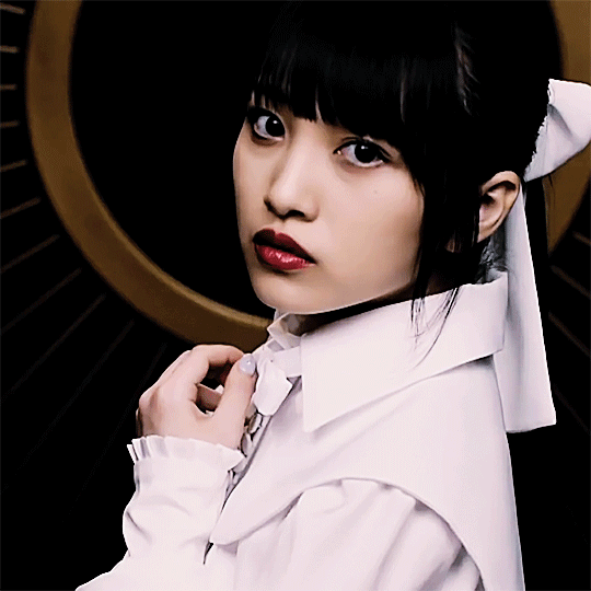 GIF from akb48's darashinai aishikata music video of one of mukaichi mion's solo angle shots